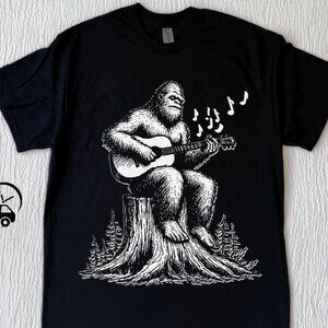 Bigfoot Playing Guitar T-Shirt | Sasquatch Music Graphic Tee | Funny Cryptid